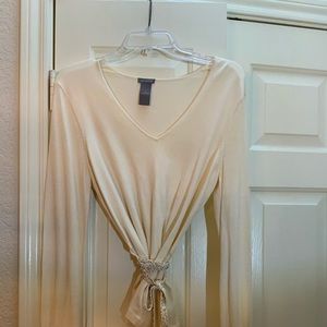 This dressy cream sweater with a little bling is such a dream!